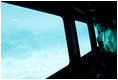 Mrs. Laura Bush looks out from underwater windows during her coral reefs and ocean conservation tour Saturday, May 17, 2008, in Sharm El Sheikh, Egypt.