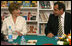 Mrs. Laura Bush smiles as she participates in a Big Read Egypt/U.S. roundtable discussion Sunday, May 18, 2008, with students at the Fayrouz Experimental School for Languages at Sharm El Sheikh. Mrs. Bush told the participants that the Big Read partnership will use literature to enhance understanding of each other’s societies and will also awaken the joy of reading in both Egyptians and Americans, particularly young people. Sitting with her is Dr. Yousry Saber Hussein El-Gamal, Minister of Education.