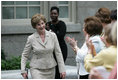 Mrs. Laura Bush is applauded following her address at a Smithsonian Institution luncheon Tuesday, May 27, 2008 in Washington, D.C., where Mrs. Bush was honored for her contributions to the arts in America.