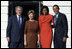 President George W. Bush and Mrs. Laura Bush and President-elect Barack Obama and Mrs. Michelle Obama pause for photographs Monday, Nov. 10, 2008, after the Obama's arrival at the South Portico of the White House.