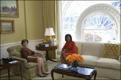 Mrs. Laura Bush and Mrs. Michelle Obama sit in the private residence of the White House Monday, Nov. 10, 2008, after the President-elect and Mrs. Obama arrived for a visit.