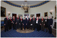 President George W. Bush and Mrs. Laura Bush stand with the recipients of the 2008 National Humanities Medal in the Blue Room at the White House Monday, Nov., 17, 2008. Pictured from left, Thomas A. Saunders III, president, and Jordan Horner Saunders, Board of Directors, North Shore Long Island Jewish Health Systems; Albert Marrin, author; Richard Brookhiser, Senior Editor, National Review; Harold Holzer, Senior Vice President for External Affairs, Metropolitan Museum of Art; Gabor S. Boritt, Director, Civil War Institute, Gettysburg College; Milton J. Rosenberg, WGN Radio Chicago; Myron Magnet, editor, City Journal; Adair Wakefield Margo, Presidential Citizen Medal recipient; Robert H. Smith, president, Vornado/Charles E. Smith; Laurie Norton, Director and CEO, Norman Rockwell Museum; Bruce Cole, Presidential Citizen Medal recipient.