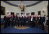 President George W. Bush and Mrs. Laura Bush stand with the recipients of the 2008 National Humanities Medal in the Blue Room at the White House Monday, Nov., 17, 2008. Pictured from left, Thomas A. Saunders III, president, and Jordan Horner Saunders, Board of Directors, North Shore Long Island Jewish Health Systems; Albert Marrin, author; Richard Brookhiser, Senior Editor, National Review; Harold Holzer, Senior Vice President for External Affairs, Metropolitan Museum of Art; Gabor S. Boritt, Director, Civil War Institute, Gettysburg College; Milton J. Rosenberg, WGN Radio Chicago; Myron Magnet, editor, City Journal; Adair Wakefield Margo, Presidential Citizen Medal recipient; Robert H. Smith, president, Vornado/Charles E. Smith; Laurie Norton, Director and CEO, Norman Rockwell Museum; Bruce Cole, Presidential Citizen Medal recipient.