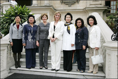 Mrs. Laura Bush stands for photographs on the steps of the Government Palace Residence Saturday, Nov. 22, 2008, with spouses of APEC leaders following a breakfast hosted by Mrs. Pilar Nores de Garcia, First Lady of Peru, in Lima. With her, from left are: Madam Ho, Spouse of Prime Minister Lee Hsien Loong of Singapore; Mrs. Kristiani Herawati, spouse of Indonesia's President Susilo Bambang Yudhoyono; Mrs. Bush; Mrs. Pilar Nores Bodereau de Garcia, spouse of Peru's President Alan Garcia; Mrs. Kim Yoon-ok, spouse of President Lee Myung-bak; Mrs. Rosmah Mansor, spouse of Malaysian Deputy Prime Minister Najib Razak, and Mrs. Chikako Aso, wife of Prime Minister Taro Aso of Japan.