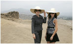 Mrs. Laura Bush and Ms. Barbara Bush stand inside the Pachacamac Archaeological Site in Lurin, Peru, Saturday, Nov. 22, 2008, during a tour of the ruins as part of the APEC Spouses Program. The Pachacamac site is a complex of adobe pyramids in the Lurin valley, on Peru's central coast, and dates from AD 200.