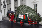 Mrs. Laura Bush delivers remarks as she stands with the White House Christmas tree Sunday, Nov. 30, 2008, in front of the North Portico of the White House. The Fraser Fir tree, from River Ridge Farms in Crumpler, N.C., will be on display in the Blue Room of the White House for the 2008 Christmas season.