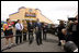 President George W. Bush and Mrs. Laura Bush are joined by local small business leaders for remarks on the economy Monday, Oct. 6, 2008, outside Olmos Pharmacy in San Antonio, Texas.