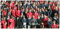 President George W. Bush joined by Mrs. Laura Bush delivers remarks to the members of the 2008 United States Summer Olympic and Paralympic Teams Tuesday, Oct. 7, 2008, on the South Lawn of the White House. The President said in his remarks, "The Olympic and Paralympic teams worked hard to get to this moment. Whether you won a medal or not, it really doesn't matter in the long run. What really matters is the honor you brought to your sports and to your families and to your country."