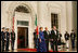 President George W. Bush and Mrs. Laura Bush welcome Italian Prime Minister Silvio Berlusconi Monday evening, Oct. 13, 2008, to the North Portico of the White House for a State Dinner in his honor.