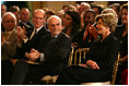 After providing remarks, Mrs. Laura Bush listens from the audience in the East Room of the White House on Oct. 7, 2008, as the 2008 National Medals for Museum and Library Service Ceremony honored five museums and five libraries who have demonstrated outstanding public service.