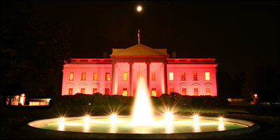 Floodlights turned the north side of the the White House pink on the evening of Oct. 7, 2008 to raise awareness about breast cancer. The unique view of the North Portico facing Lafayette Park was to observe Breast Cancer Awareness Month. Breast cancer awareness is a cause for which Mrs. Laura Bush has worked to motivate both public and private sectors, worldwide, as as she has encouraged collaborative research to find a cure. The World Health Organization says each year more than 1.2 million people worldwide are diagnosed with it and breast cancer is one of the leading causes of death for women.