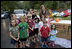 Mrs. Laura Bush stops and poses with children at their lemonade stand during her visit to Charlotte, N.C., Friday, October 10, 2008.