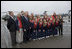 President George W. Bush and First Lady Laura Bush pose with members of the 2008 Little League World Searies Championship team at Charleston Air Force Base in Charleston, S.C., Friday, October 10, 2008.