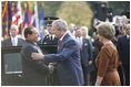 President George W. Bush and Mrs. Laura Bush welcome Italian Prime Minister Silvio Berlusconi upon his arrival Monday, Oct. 13, 2008 to the White House.