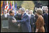 President George W. Bush and Mrs. Laura Bush welcome Italian Prime Minister Silvio Berlusconi upon his arrival Monday, Oct. 13, 2008 to the White House.