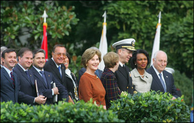 Mrs. Laura Bush stands on the South Lawn of the White House Oct. 13, 2008, during the State Arrival for Italian Prime Minister Silvio Berlusconi. Standing next to Mrs. Bush near the arrival podium are Mrs. Deborah Mullen, Admiral Mike Mullen, Chairman of the Joint Chiefs of Staff, Secretary of State Condoleezza Rice and Vice President Dick Cheney.