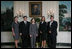 Mrs. Laura Bush poses Oct. 21, 2008 with the U.S. National Commission for UNESCO Laura W. Bush Traveling Fellows in the Diplomatic Reception Room of the White House. From left are Laura Olsen, David Lee, Heather McGee and Michael Aguilar.