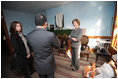 Mrs. Laura Bush visits the Lower East Side Tenement Museum in New York City, Friday, Oct. 24, 2008, with her daughter, Barbara Bush. The tour is led by Mr. David Eng, Vice President of Public Affairs, of the museum. The museum received a Preserve America Presidential Award in may and was awarded a National Medal for Museum and Library Services last month for its work in helping to preserve the immigrant history that shapes our country.