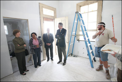 Mrs. Laura Bush is joined by homeowner Joretta Roman as she views the renovation project at Roman's home Thursday, October 30, 2008, in New Orleans, La., during a tour of the home being rennovated by Catholic Charities Operation Helping Hands. The home sustained damage during Hurricane Katrina.