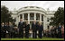 President George W. Bush and Mrs. Laura Bush and Vice President Dick Cheney and Mrs. Lynne Cheney stand at attention during the observance Thursday, Sept. 11, 2008, on the South Lawn of the White House of the seventh anniversary of the September 11 terrorist attacks.