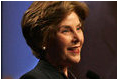 Mrs. Laura Bush speaks to the ServiceNation Summit at the Hilton New York Hotel Grand Ballroom in New York City on Sept. 12, 2008. Mrs. Bush cited President Bush's challenge to service and added that "Americans today have more opportunities to volunteer through government-supported national service programs."