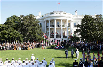 President George W. Bush and Mrs. Laura Bush welcome President John Agyekum Kufuor and Mrs. Theresa Kufuor of Ghana Monday, Sept. 15, 2008, during the South Lawn Arrival Ceremony for President Kufuor and Mrs. Kufuor of Ghana on the South Lawn of the White House.