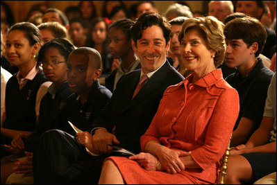 Mrs. Laura Bush and Joe Torsella, President of the National Constitution Center, listen to performance for school children noting the 221st anniversary of the signing of the United States Constitution on Constitution Day. The program, in the East Room of the White House on Sept. 17, 2008, was designed to help make the children more aware of United States History. Mrs. Bush pointed out that Constitution Day is designed to encourage Americans to learn more about our country's founding documents. The performance was part of the six-year-old We the People program created by President George W. Bush. 