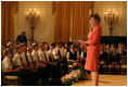 Mrs. Laura Bush welcomes a group of children to the East Room of the White House on Wednesday, Sept. 17, 2008, for an American history performance by the National Constitution Center to highlight the 221st anniversary of the signing of the United States Constitution. 