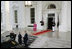 President George W. Bush and Mrs. Laura Bush welcome President of Colombia Alvaro Uribe Saturday, Sept. 20, 2008, to a social dinner at the White House. 