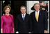 President George W. Bush and Mrs. Laura Bush greet Colombian President Alvaro Uribe on the North Portico Saturday, Sept. 20, 2008, for a social dinner at the White House.