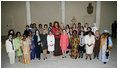 Mrs. Laura Bush, center in salmon-colored suit, hosts 36 other first ladies from around the world at the White House Symposium on Advancing Global Literacy at the Metropolitan Museum of Art in New York City, Sept. 22, 2008. The first ladies were in New York City while their spouses attend the United Nations General Assembly.