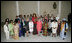 Mrs. Laura Bush, center in salmon-colored suit, hosts 36 other first ladies from around the world at the White House Symposium on Advancing Global Literacy at the Metropolitan Museum of Art in New York City, Sept. 22, 2008. The first ladies were in New York City while their spouses attend the United Nations General Assembly.