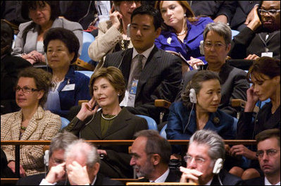 Mrs. Laura Bush listens from the audience as President George W. Bush delivers his address Tuesday, Sept. 23, 2008, to the United Nations General Assembly in at the U.N. Headquarters in New York City. Sitting with her from left are: Dr. Cheryl Benard, spouse of U.S. Ambassador to the United Nations Zalmay Khalilzad; Mrs. Yoo Soon-taek, spouse of U.N. Secretary-General Ban Ki-moon, and Mrs. Carla Bruni Sarkozy, spouse of French President Nicolas Sarkozy.