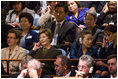 Mrs. Laura Bush listens from the audience as President George W. Bush delivers his address Tuesday, Sept. 23, 2008, to the United Nations General Assembly in at the U.N. Headquarters in New York City. Sitting with her from left are: Dr. Cheryl Benard, spouse of U.S. Ambassador to the United Nations Zalmay Khalilzad; Mrs. Yoo Soon-taek, spouse of U.N. Secretary-General Ban Ki-moon, and Mrs. Carla Bruni Sarkozy, spouse of French President Nicolas Sarkozy.