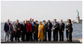 President George W. Bush and Mrs. Laura Bush participate in a photo opportunity with political dissidents Tuesday, Sept. 23, 2008, on Governors Island in New York. President Bush stated in his remarks, "Here in America, we have an obligation to help others realize the blessings of liberty. And so we want to thank you very much for your courage. We thank you for your set of beliefs that remain strong."