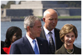 President George W. Bush and Mrs. Laura Bush participate in a photo opportunity with political dissidents Tuesday, Sept. 23, 2008, on Governors Island in New York. "I've been inspired by the stories I have heard here," said Mrs. Bush in her remarks as she noting the plight of the Burmese people and their struggle for democracy and human rights. 