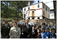 Mrs. Laura Bush stands with children from the Adam Clayton Powell Jr. Elementary School (P.S. 153) and the Boys and Girls Club of Harlem as she addresses media after participating in a First Bloom program at the Hamilton Grange National Memorial in New York City, Sept. 24, 2008. The plantings are part of the restoration efforts at the historic home of Alexander Hamilton.