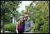 Jenna Hager, daughter of President George W. Bush and Mrs. Laura Bush, and husband Henry Hager pose for a photo after shoveling dirt onto a Cherokee Princess Dogwood during a commemorative tree planting ceremony Saturday, Sept. 27, 2008, on the South Lawn of the White House.