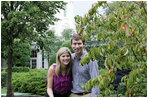 Jenna Hager, daughter of President George W. Bush and Mrs. Laura Bush, and husband Henry Hager pose for a photo after shoveling dirt onto a Cherokee Princess Dogwood during a commemorative tree planting ceremony Saturday, Sept. 27, 2008, on the South Lawn of the White House.