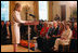 Mrs. Laura Bush and daughter Jenna Hager listen to author Jan Brett during the National Book Festival Breakfast Saturday, Sept. 27, 2008, in the East Room of the White House. 