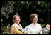 Mrs. Laura Bush talks with Mrs. Kateryna Yushchenko, wife of President Viktor Yushchenko of Ukraine, during a walk through the Rose Garden Monday, Sept. 29, 2008, at the White House.