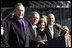 President George W.Bush stands with his father, former President George H.W. Bush and Mrs.Laura Bush during the commissioning ceremony of the USS George H.W. Bush (CVN 77) aircraft carrier Saturday, Jan 10, 2009 in Norfolk, Va.