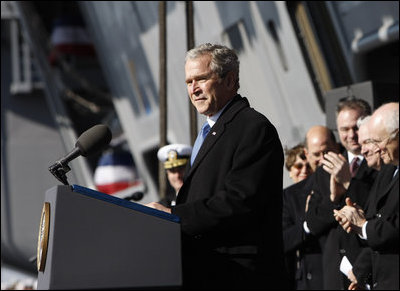 President George W. Bush addresses his remarks in honor of his father, former President George H. W. Bush, at the commissioning ceremony of the USS George H.W. Bush (CVN 77) aircraft carrier Saturday, Jan 10, 2009 in Norfolk, Va.