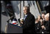 President George W. Bush addresses his remarks in honor of his father, former President George H. W. Bush, at the commissioning ceremony of the USS George H.W. Bush (CVN 77) aircraft carrier Saturday, Jan 10, 2009 in Norfolk, Va.