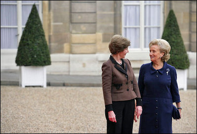 Mrs. Laura Bush visits with Madame Beradette Chirac outside the Elysee Palace during the International Centre for Missing and Exploited Children Meeting Wednesday, Jan. 17, 2007. 