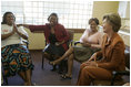 Laura Bush meets with women from Mothers to Mothers-to-Be in Cape Town, South Africa, Tuesday, July 12, 2005. The program provides support to HIV-positive women during their pregnancy. 