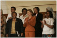 Laura Bush stands with U.S. Ambassador to South Africa Jendayi Frazer, left, during her visit to Centre for the Book, an institution established to create a culture of literacy in South Africa, Tuesday, July 12, 2005, in Cape Town. 