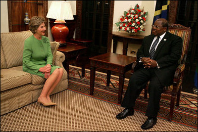 Laura Bush meets with President Benjamin Mkapa at the Presidential Residence in Dar Es Salaam, Tanzania, Wednesday, July 13, 2005. Mrs. Bush is visiting Africa to highlight U.S. aid and partnerships promoting programs for girls' education, HIV/AIDS awareness and women's empowerment. 