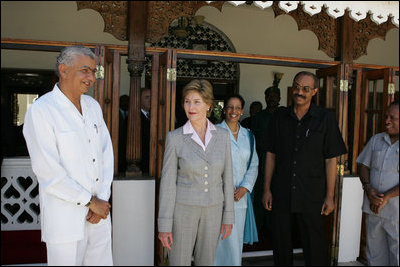 Laura Bush visits with President Amani Abeid Karume, pictured at left, in Zanzibar, Tanzania, Thursday, July 14, 2005. 