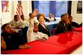 Laura Bush listens as boys participating in the Passport to Manhood program share ideas about respect and love during a visit to the Germantown Boys and Girls Club Tuesday, Feb. 3, 2005 in Philadelphia. Passport to Manhood promotes and teaches responsibility through a series of male club members ages 11-14.